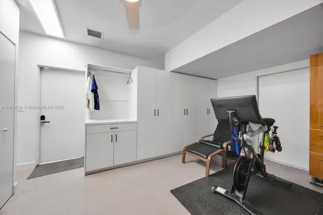 a view of a room with gym equipment