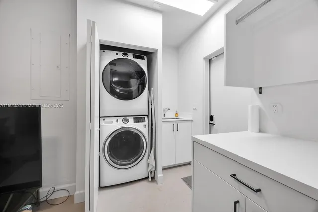 a utility room with dryer and washer