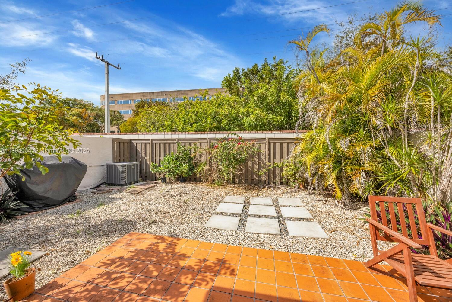8596 Southwest 115th Place Miami, FL 33173 - Photo 32 of 39 a view of a backyard with a garden