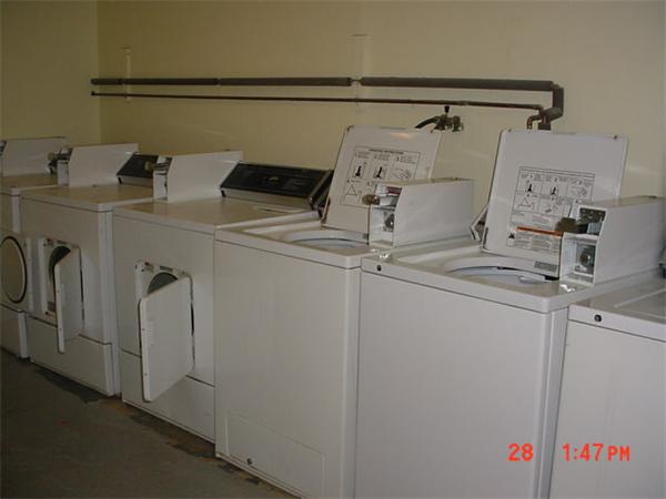 5 Turnpike Road, Unit 125 Townsend, MA 01469 - Photo 10 of 14 a utility room with dryer and washer