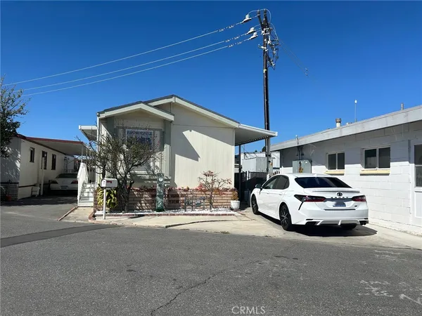 a car parked in front of a house