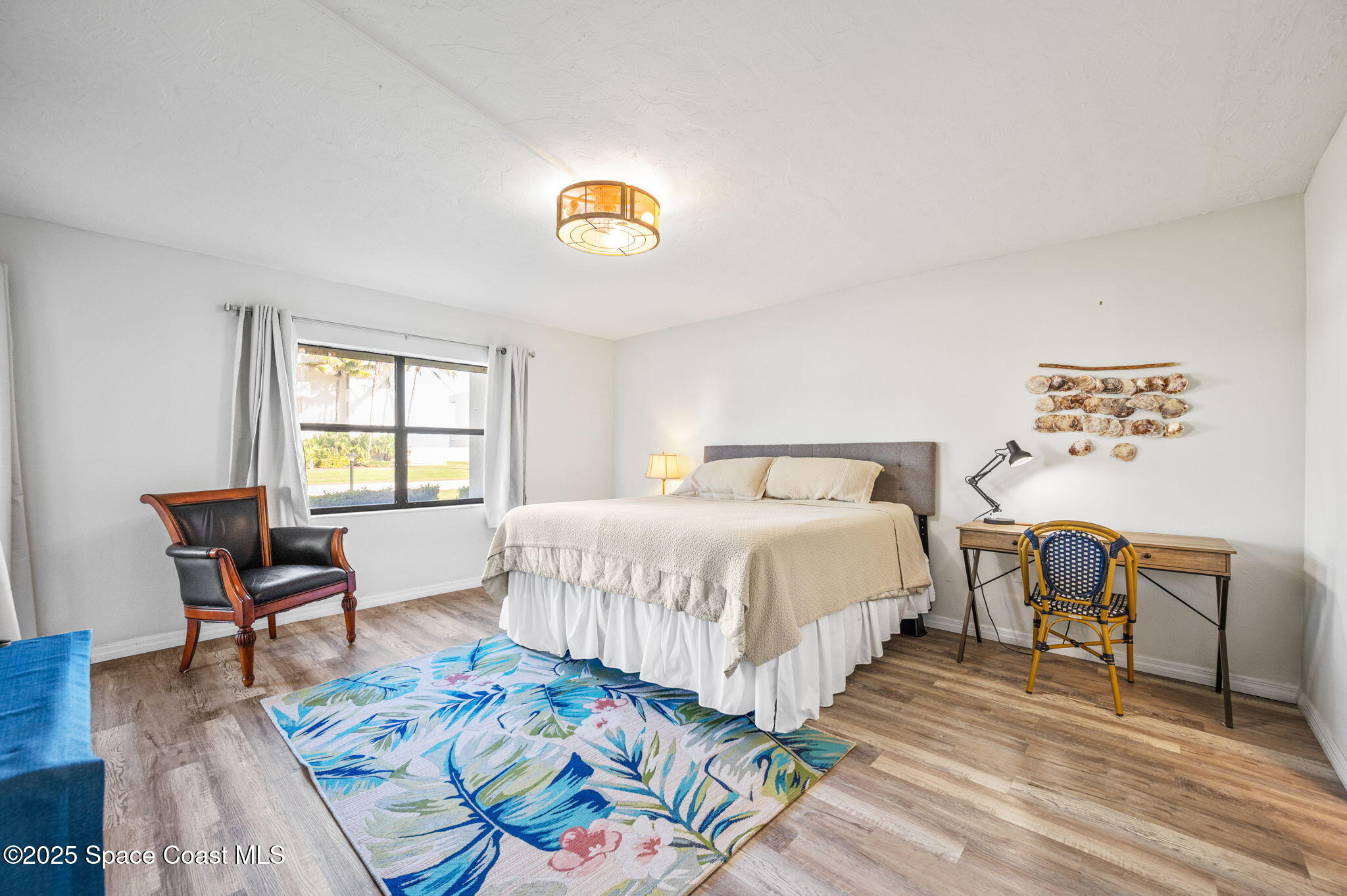 1850 Atlantic Street, Unit 111 Melbourne Beach, FL 32951 - Photo 18 of 48 Primary Room