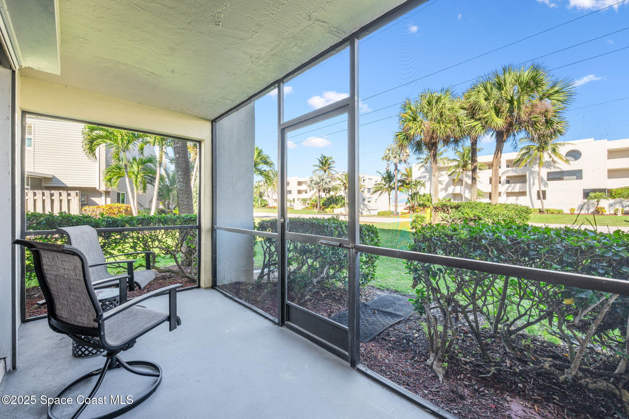 1850 Atlantic Street, Unit 111 Melbourne Beach, FL 32951 - Photo 27 of 48 Screened Porch