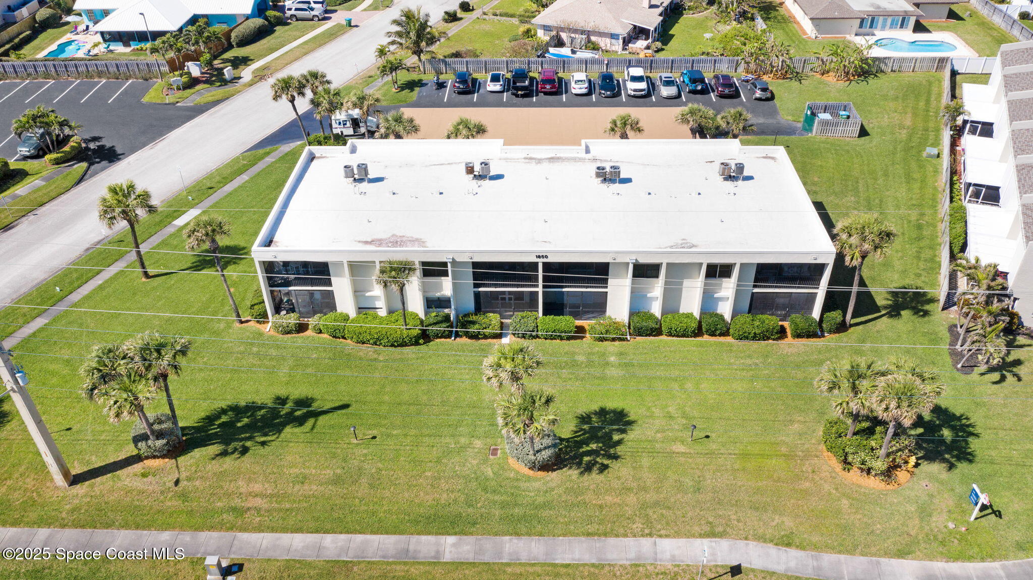 1850 Atlantic Street, Unit 111 Melbourne Beach, FL 32951 - Photo 30 of 48 Aerial of Building