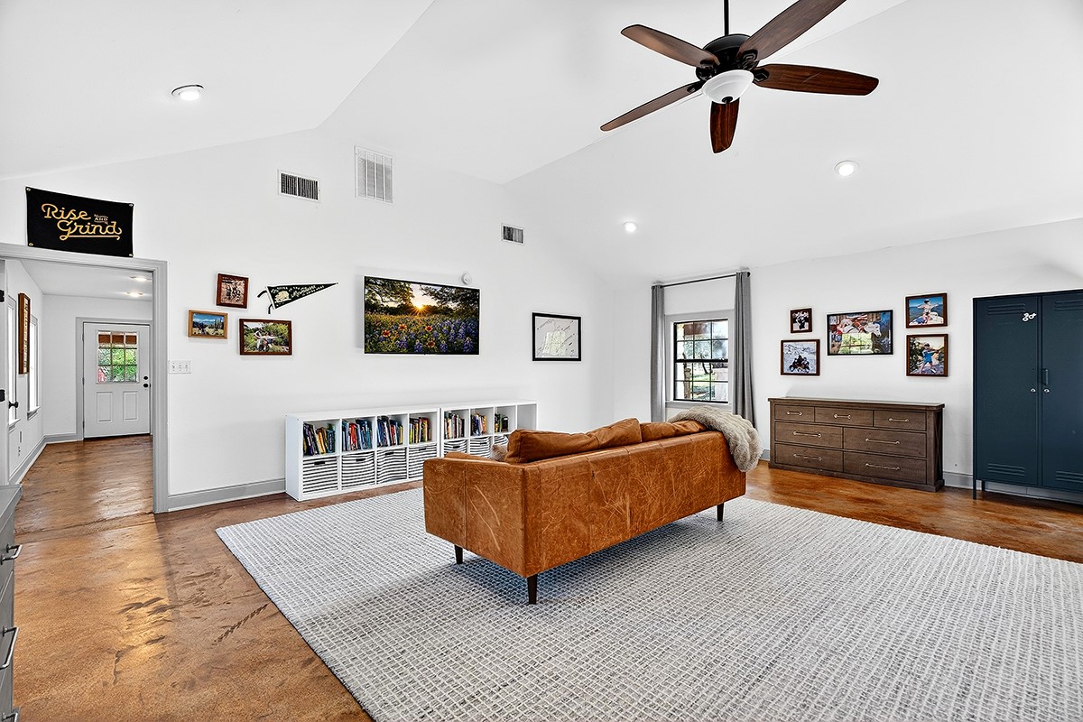 301 Medlin Creek Loop Dripping Springs, TX 78620 - Photo 20 of 40 Bonus room that can be used as a secondary living room or built out into a large primary suite or guest suite.