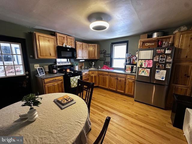 4402 Allegheny Road Manns Choice, PA 15550 - Photo 15 of 25 a kitchen with a sink appliances and cabinets