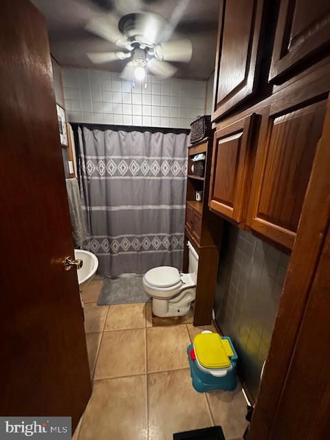 4402 Allegheny Road Manns Choice, PA 15550 - Photo 18 of 25 a bathroom with a toilet and a shower