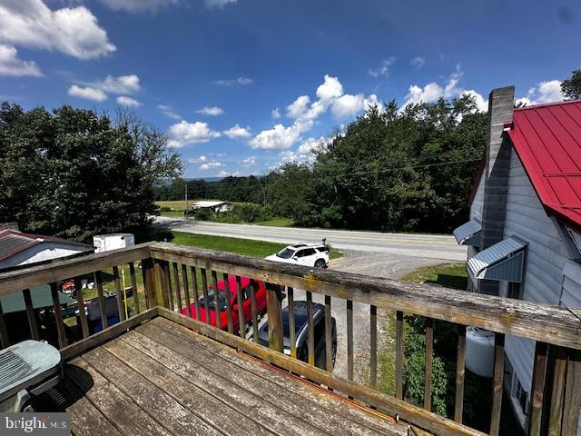 4402 Allegheny Road Manns Choice, PA 15550 - Photo 10 of 25 a view of a balcony with two chairs and a table