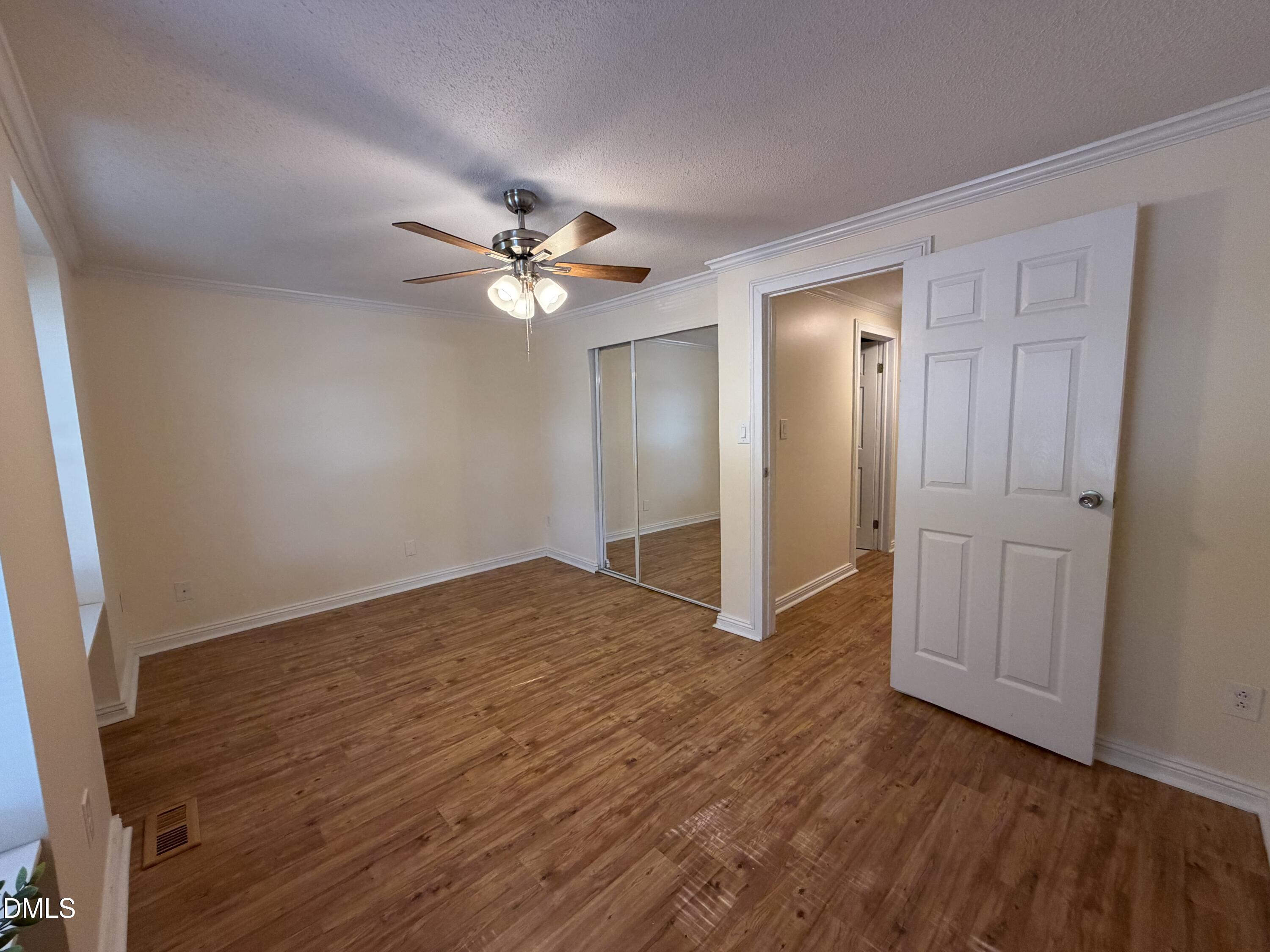 7766 Sandra Lane Raleigh, NC 27615 - Photo 22 of 29 Primary Bed - Closet