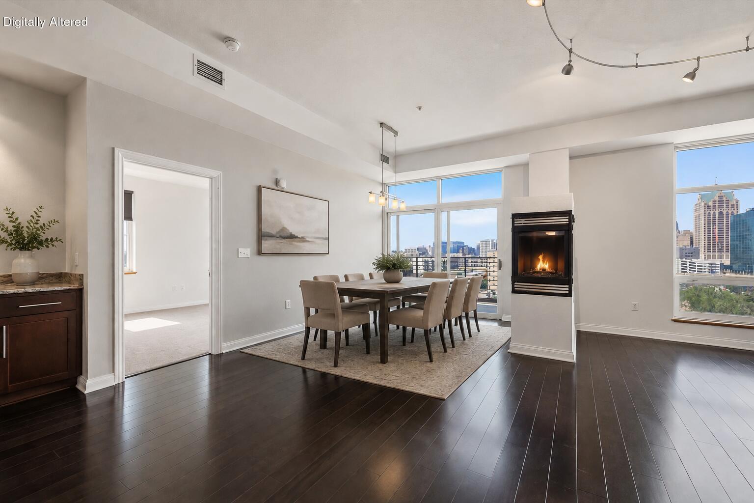 106 West Seeboth Street, Unit 920 Milwaukee, WI 53204 - Photo 13 of 51 Dining Area, Gas Fireplace, Hardwood Floors