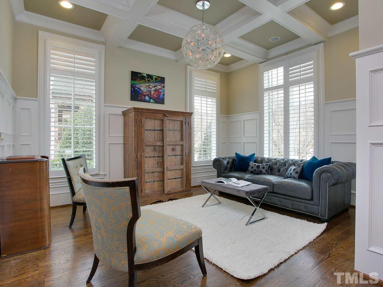 507 Guilford Circle Raleigh, NC 27608 - Photo 3 of 26 a living room with furniture and a large window