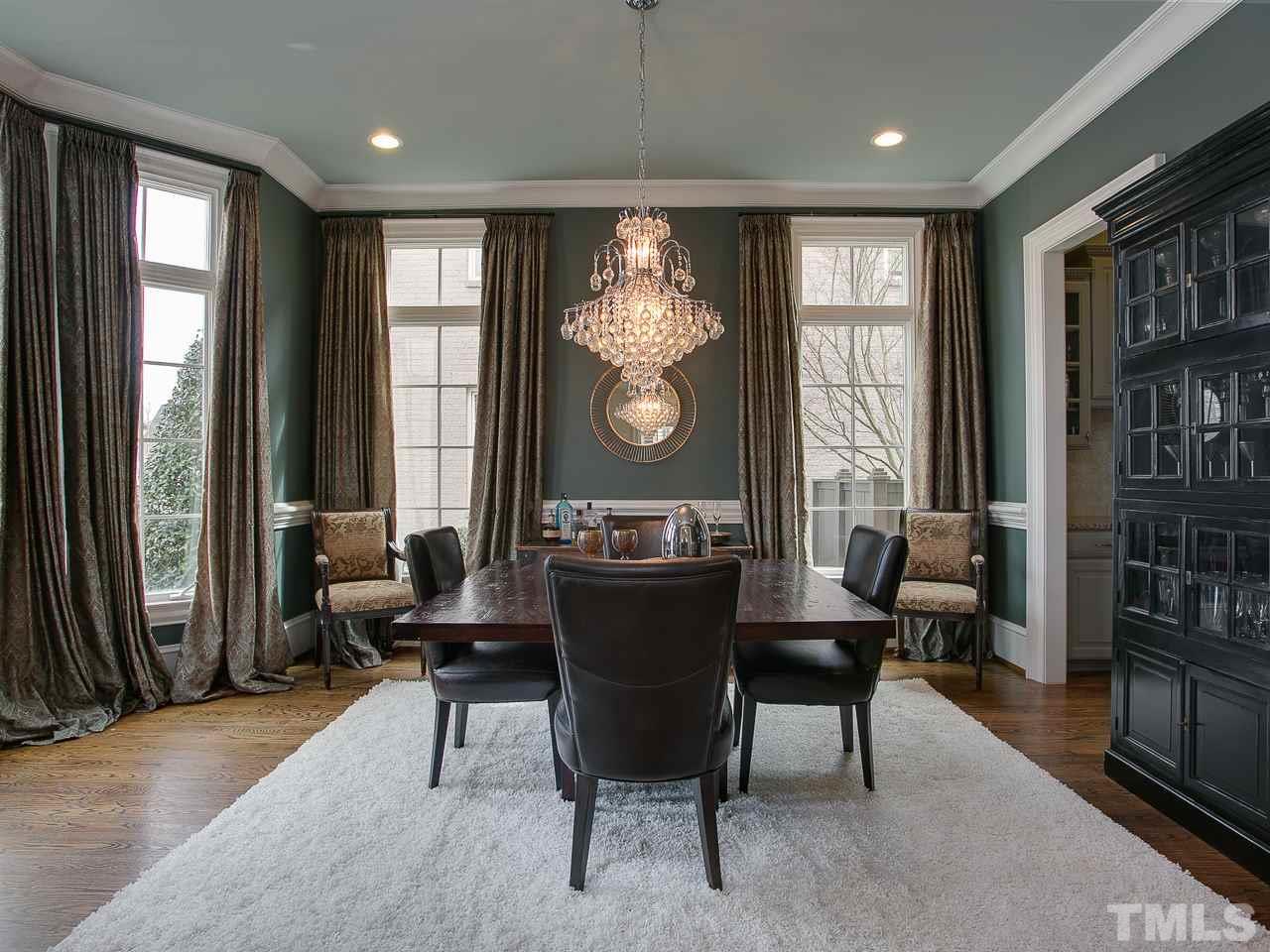 507 Guilford Circle Raleigh, NC 27608 - Photo 4 of 26 a view of a very nice looking dining room with furniture window and wooden floor