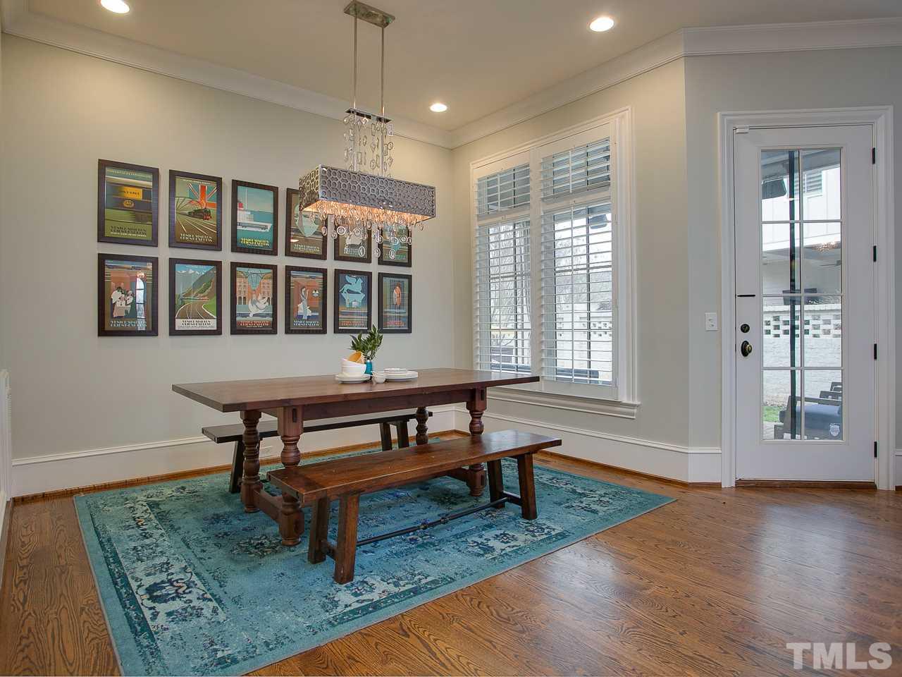 507 Guilford Circle Raleigh, NC 27608 - Photo 9 of 26 a living room with furniture and a window