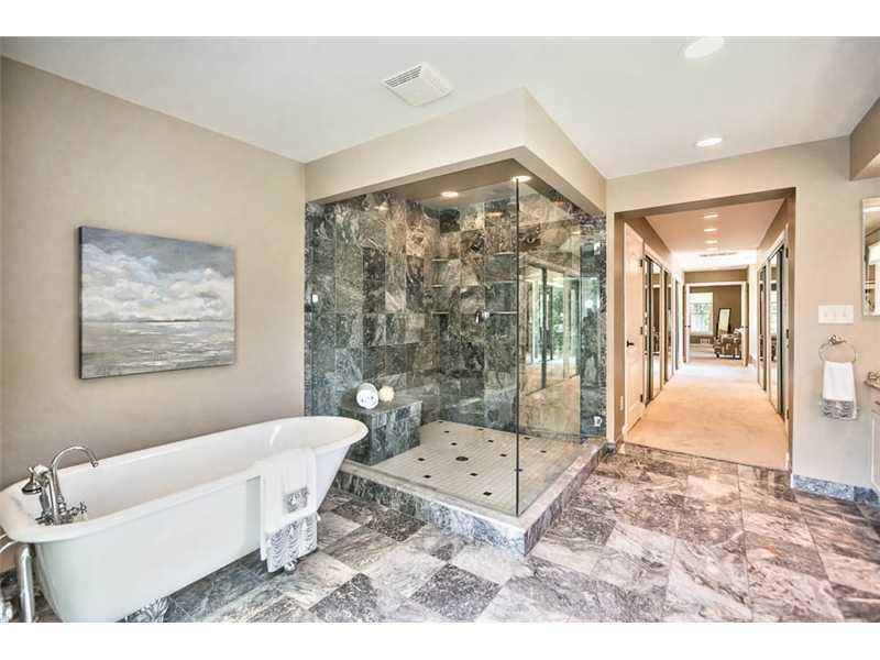 1602 Powers Run Road Fox Chapel, PA 15238 - Photo 22 of 25 Master Bath/Spa. The huge master bathroom has marble floors and shower walls, large walk-in glass enclosed shower, claw footed soaker tub, double sinks, vanity area and double doors to a private balcony.