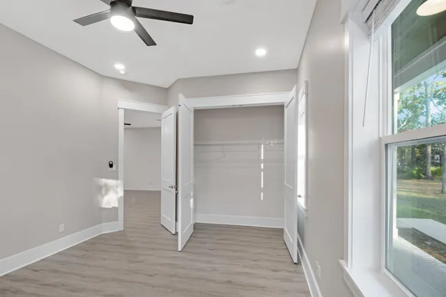 a bathroom with a tub and shower