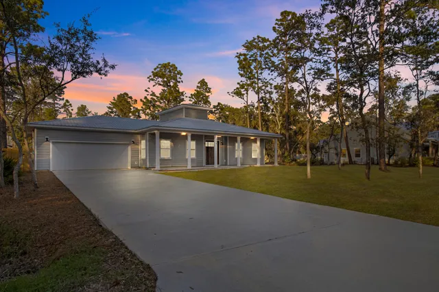 a house with trees in front of it