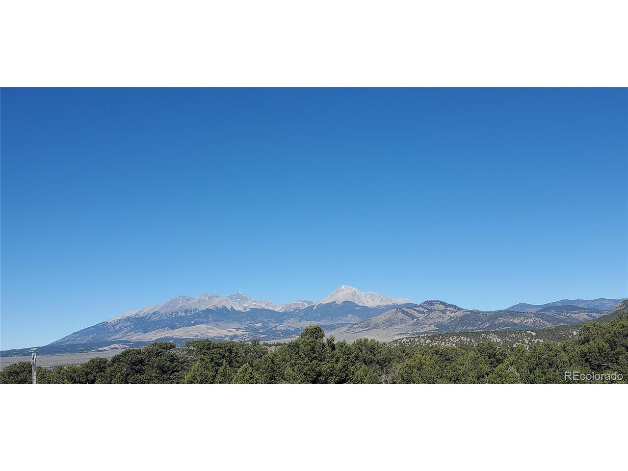 7356 Bidwell Road Fort Garland, CO 81133 - Photo 19 of 23 a view of an outdoor space and mountain view