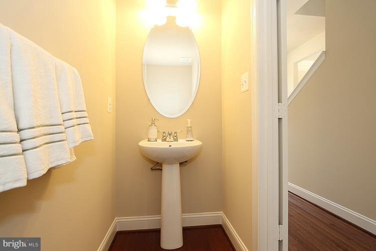 3041 Bel Pre Road Silver Spring, MD 20906 - Photo 15 of 28 a bathroom with a sink and a mirror