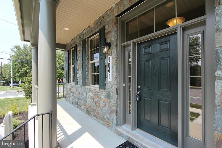 3041 Bel Pre Road Silver Spring, MD 20906 - Photo 3 of 28 a view of a brick house with a glass door