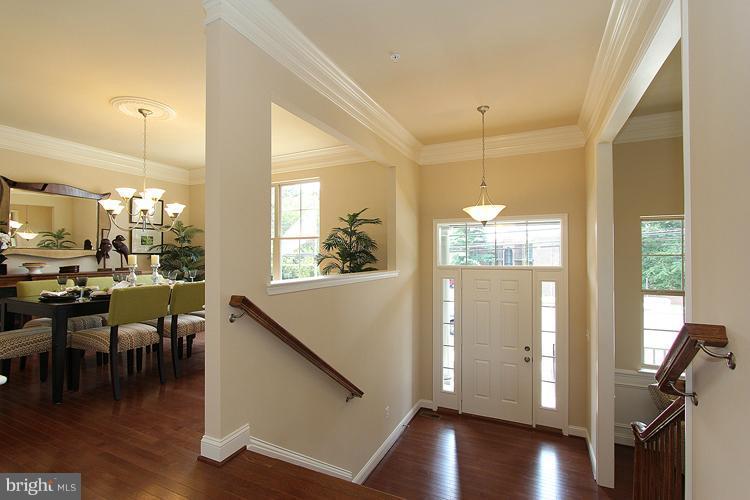 3041 Bel Pre Road Silver Spring, MD 20906 - Photo 5 of 28 a view of a dining room with furniture window and wooden floor