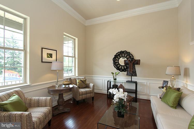 3041 Bel Pre Road Silver Spring, MD 20906 - Photo 6 of 28 a living room with furniture and wooden floor