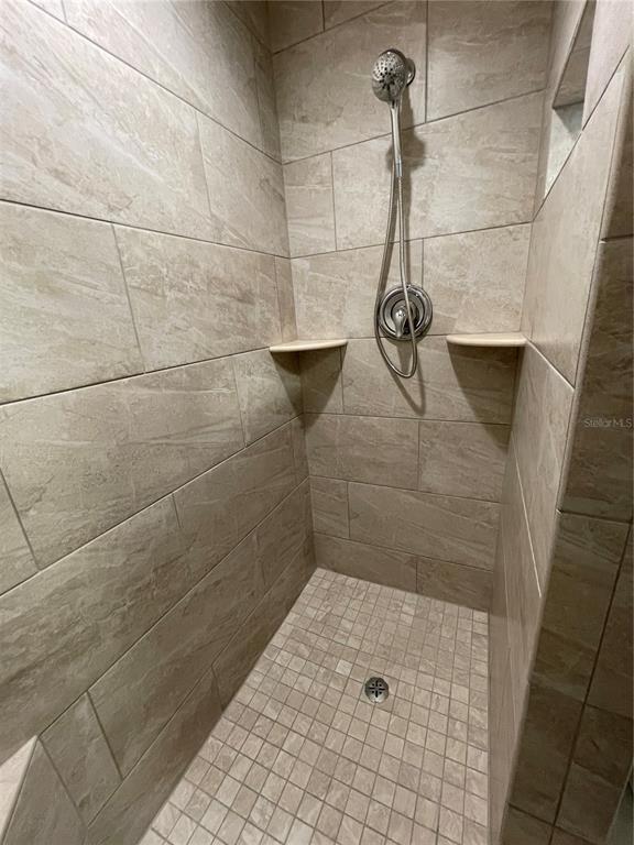 828 South Tuttle Avenue, Unit B Sarasota, FL 34237 - Photo 13 of 63 a bathroom with a shower