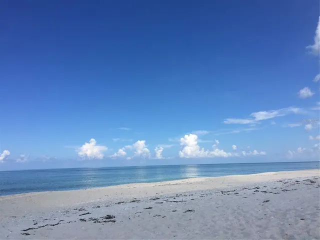 a view of a street with stores