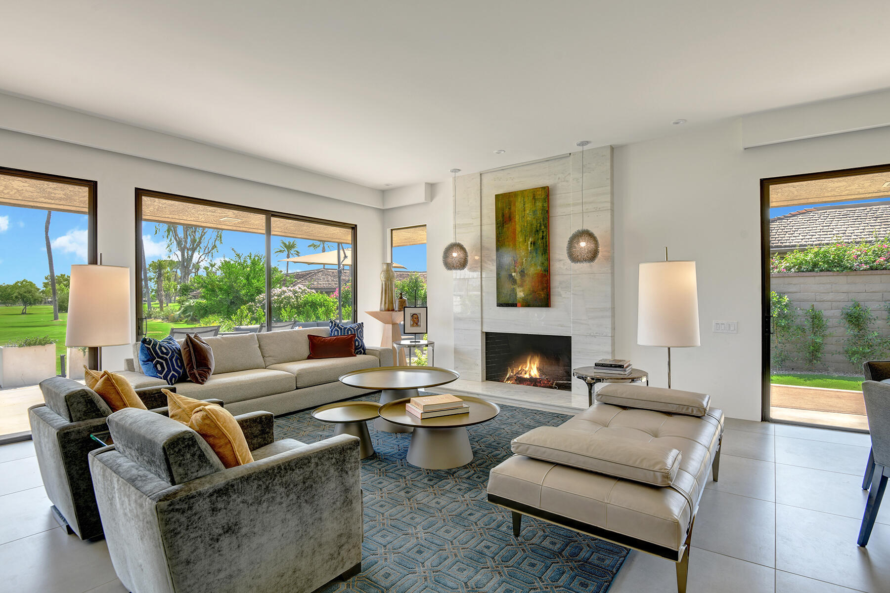 73 Princeton Drive Rancho Mirage, CA 92270 - Photo 2 of 44 a living room with furniture and a fireplace