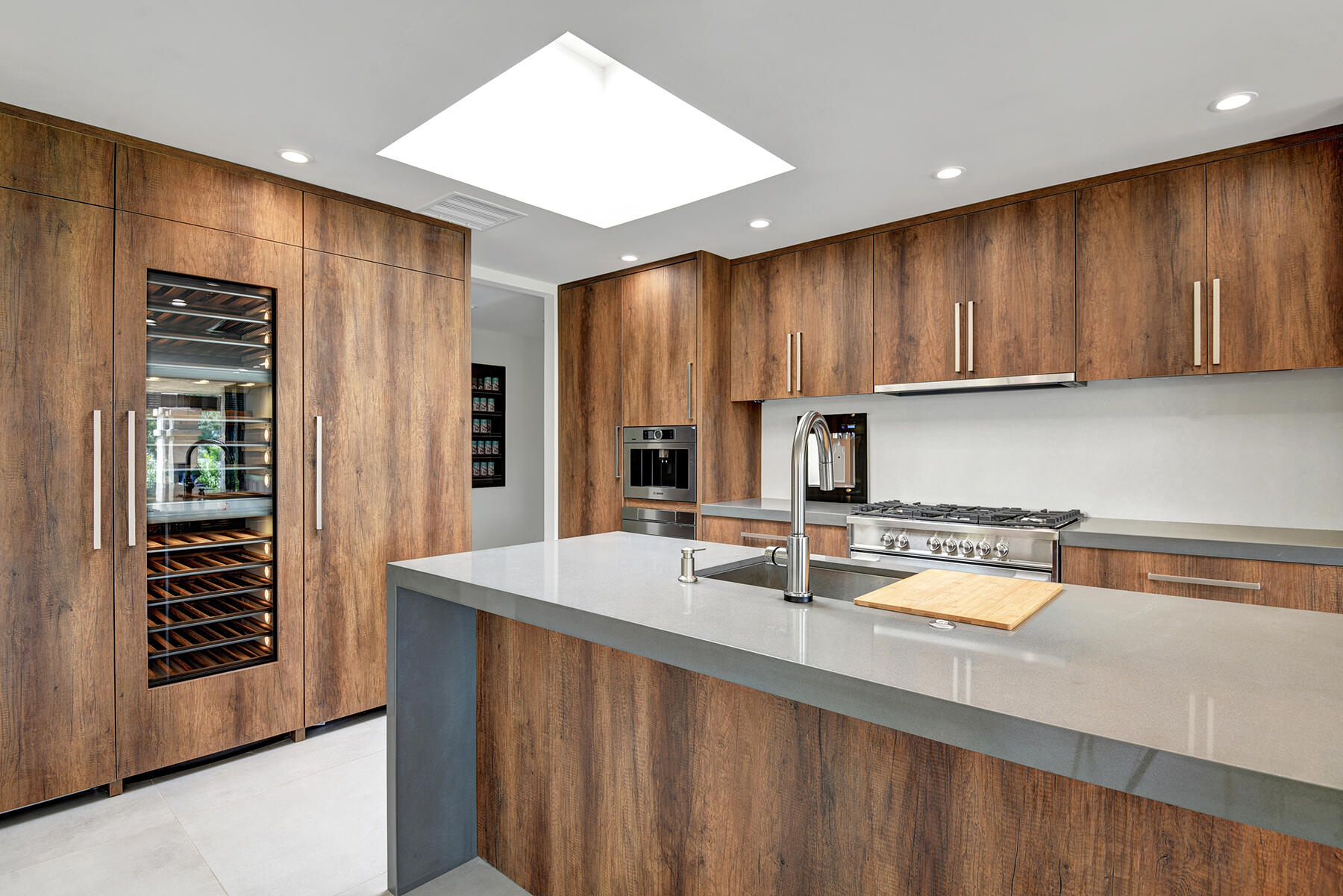 73 Princeton Drive Rancho Mirage, CA 92270 - Photo 12 of 44 a kitchen with kitchen island granite countertop a sink cabinets and stainless steel appliances