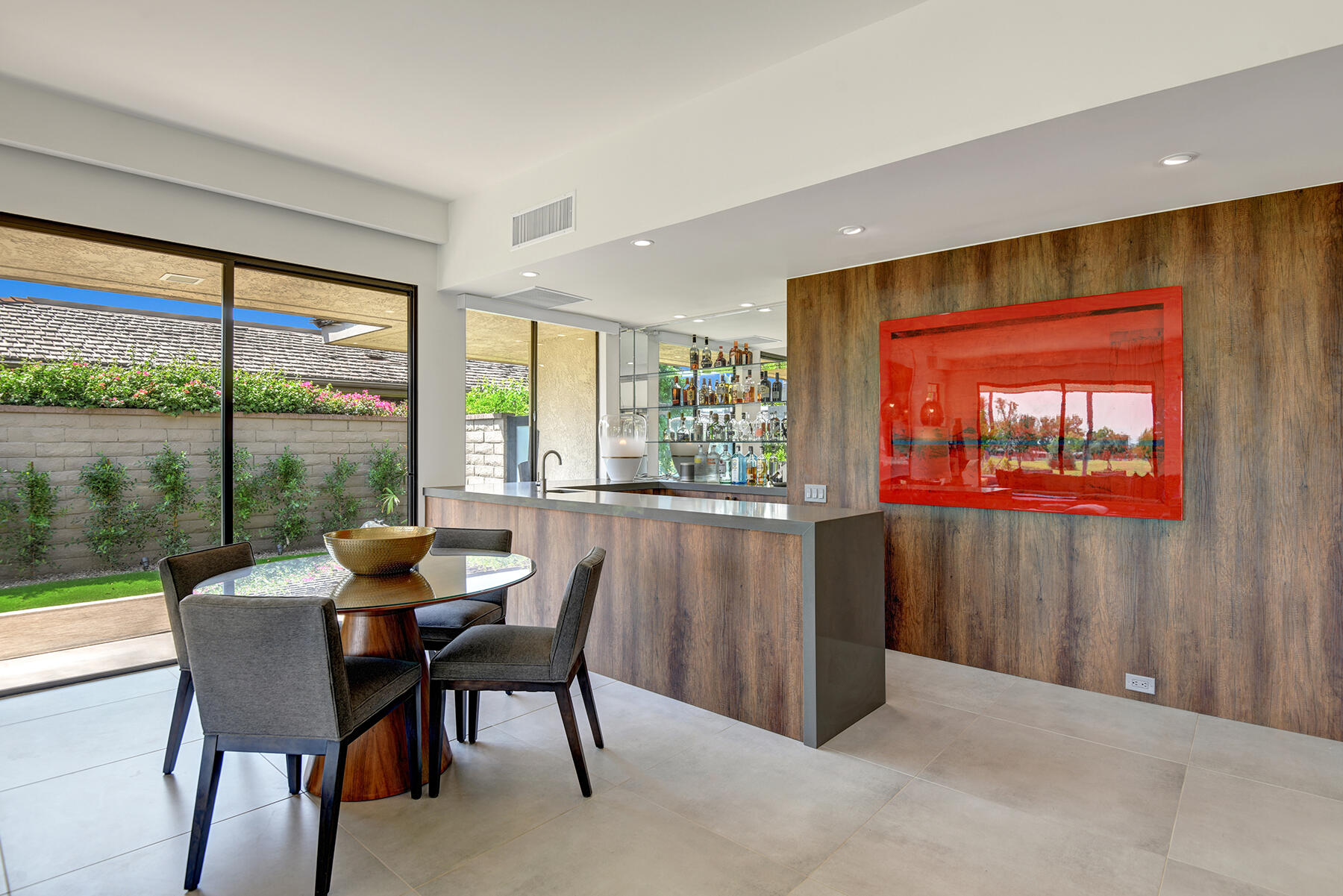 73 Princeton Drive Rancho Mirage, CA 92270 - Photo 15 of 44 a dining room with furniture and a window