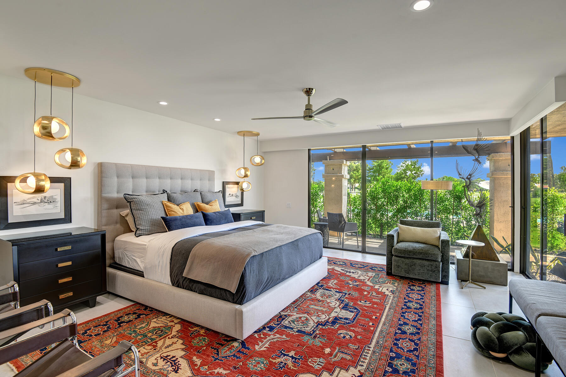 73 Princeton Drive Rancho Mirage, CA 92270 - Photo 19 of 44 a bedroom with a bed and a couch