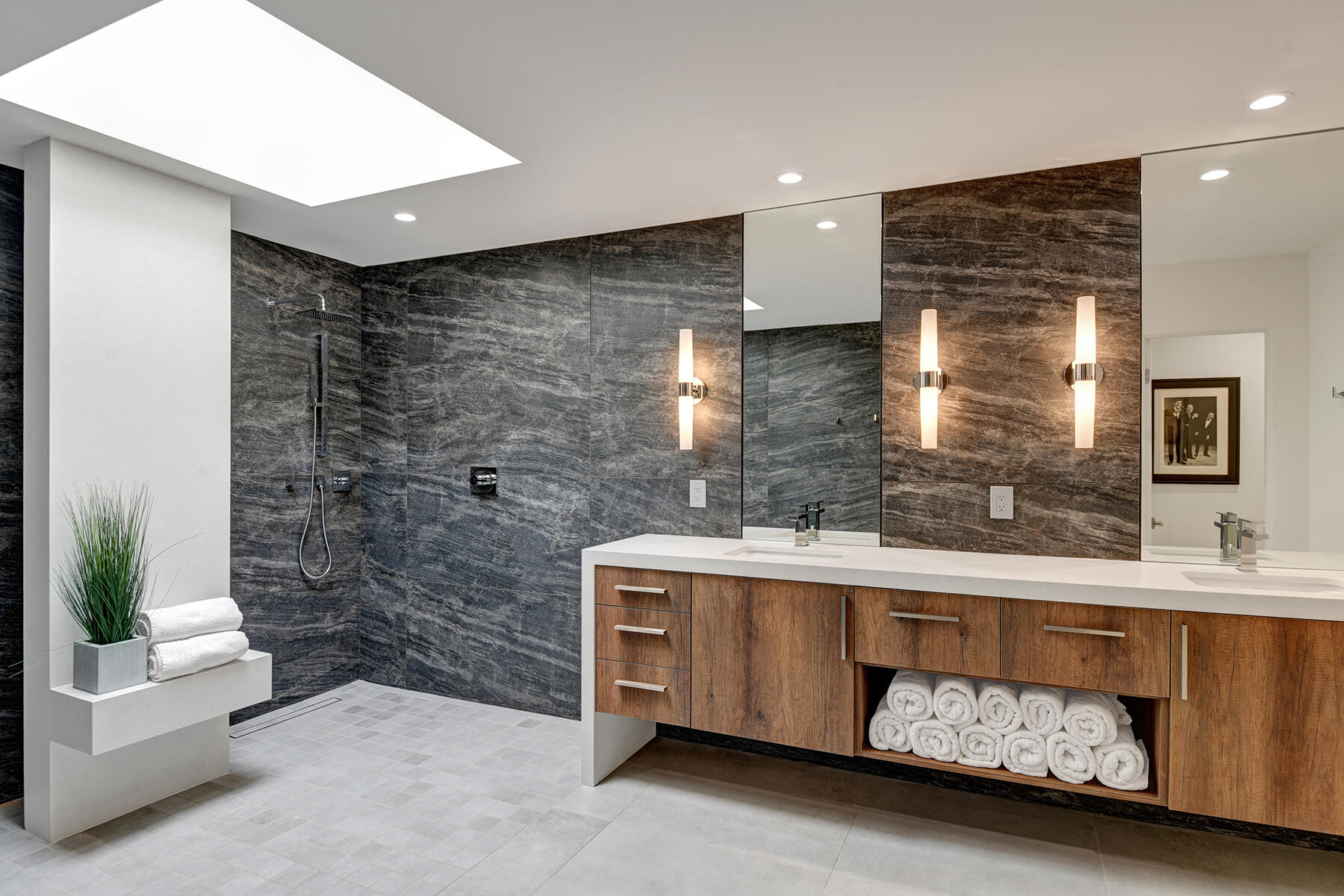 73 Princeton Drive Rancho Mirage, CA 92270 - Photo 24 of 44 a bath room with a sink and a mirror