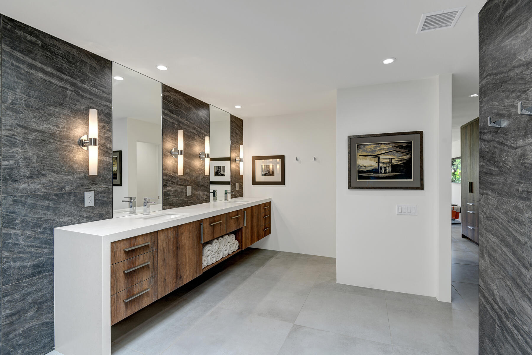 73 Princeton Drive Rancho Mirage, CA 92270 - Photo 25 of 44 a view of a bathroom with double vanity and two mirrors