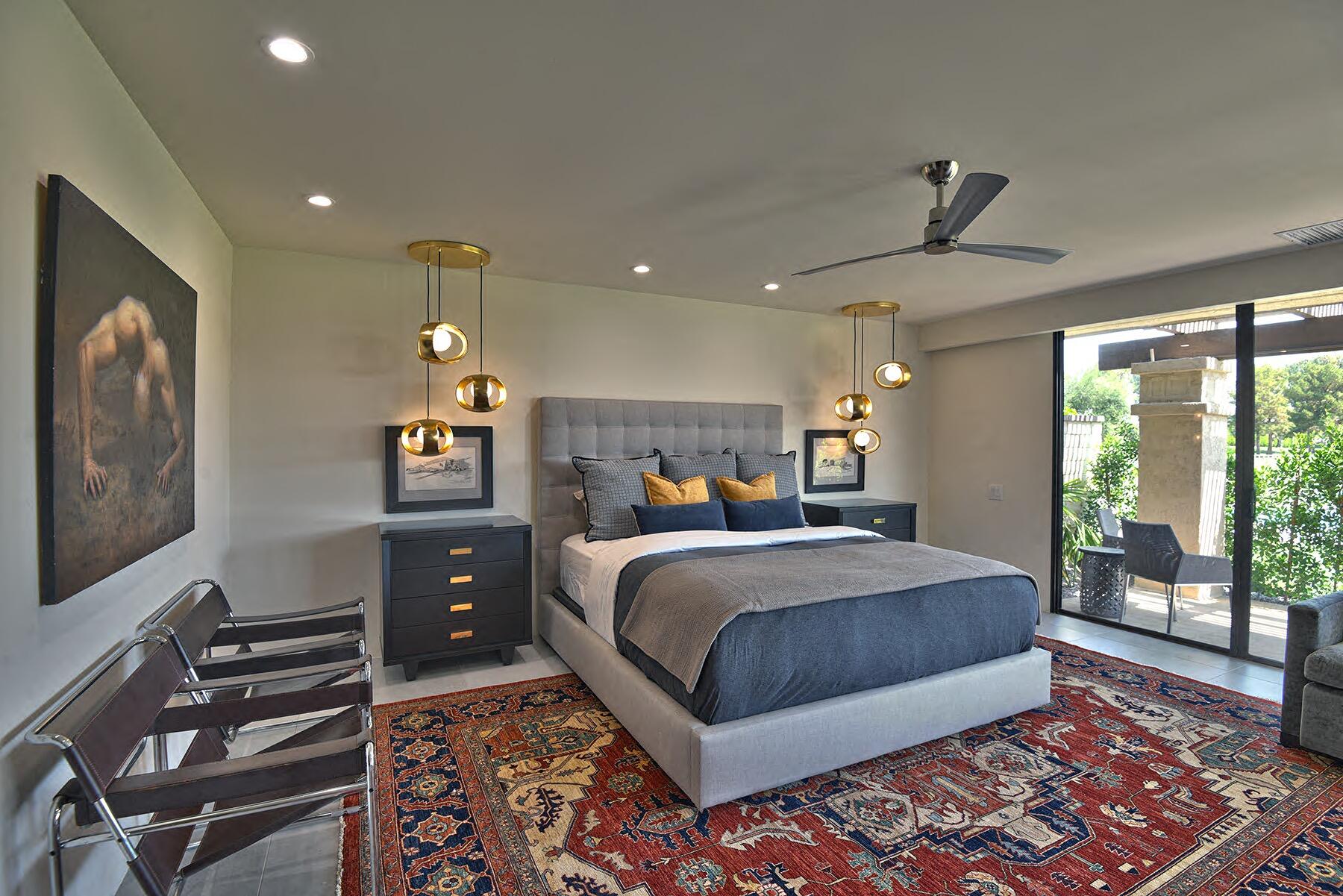 73 Princeton Drive Rancho Mirage, CA 92270 - Photo 4 of 44 a bed room with a bed and a television