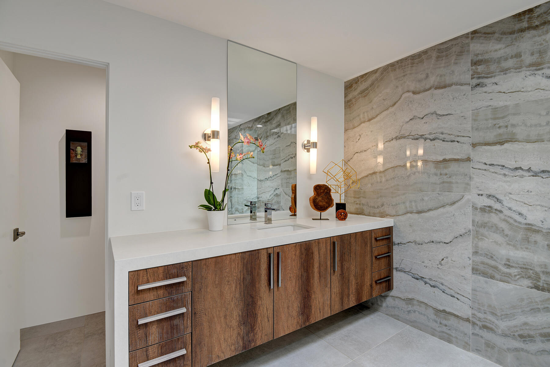 73 Princeton Drive Rancho Mirage, CA 92270 - Photo 31 of 44 a bathroom with a sink and a mirror