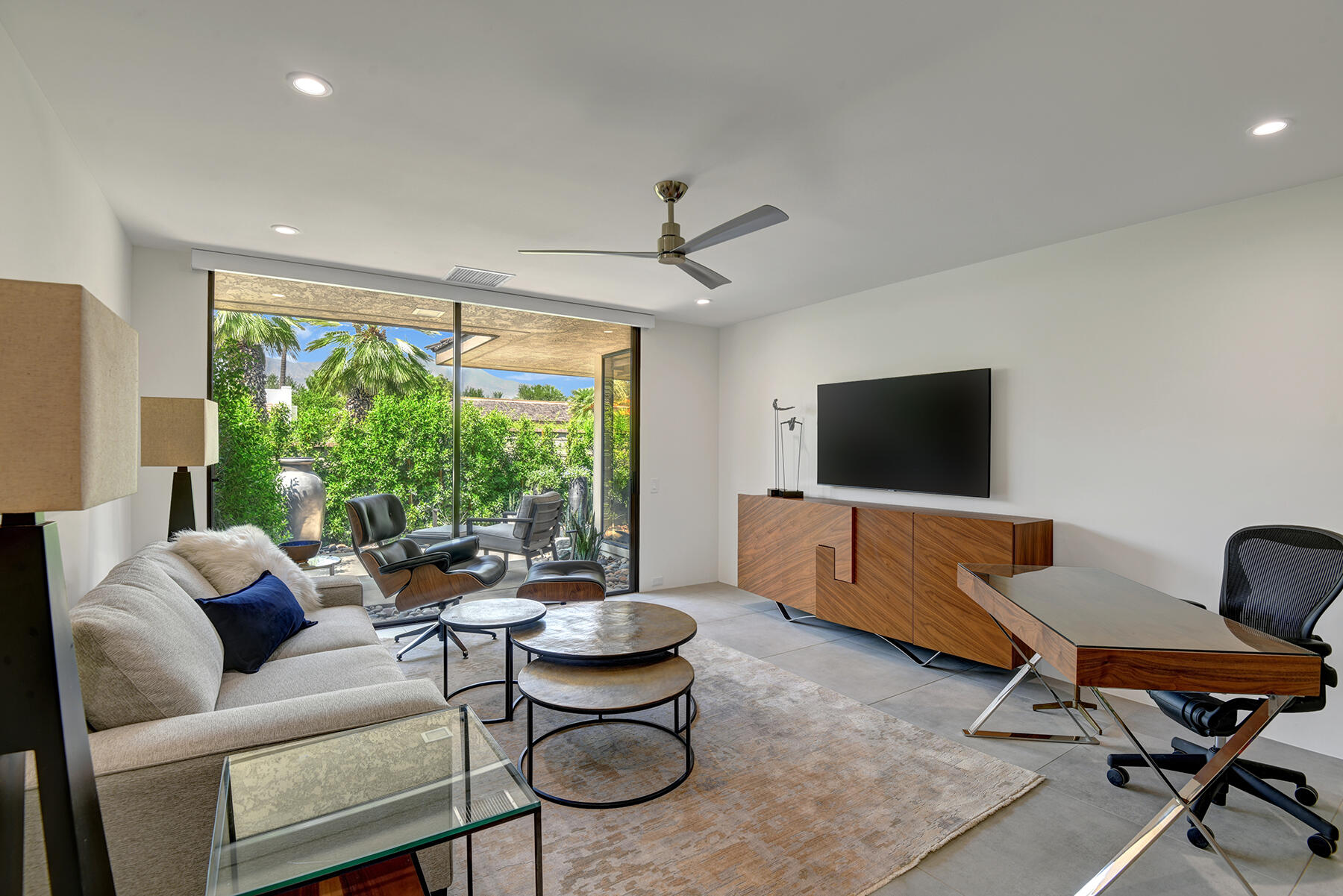 73 Princeton Drive Rancho Mirage, CA 92270 - Photo 34 of 44 a living room with furniture and a flat screen tv