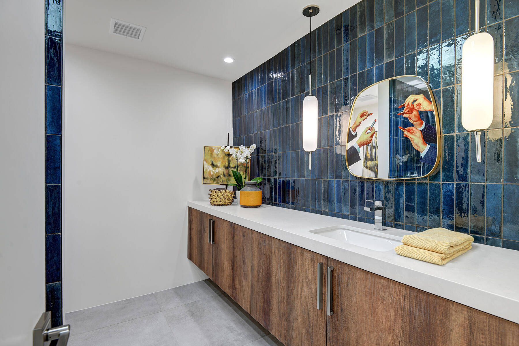 73 Princeton Drive Rancho Mirage, CA 92270 - Photo 36 of 44 a room with furniture and wall paintings