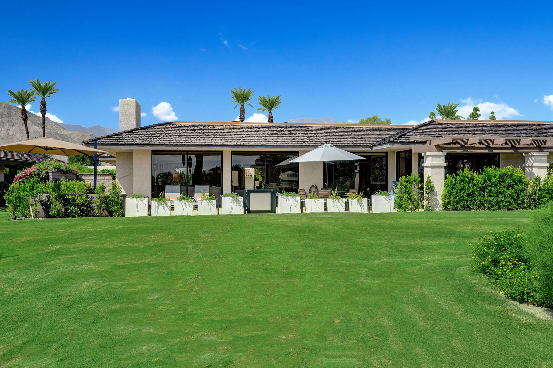 73 Princeton Drive Rancho Mirage, CA 92270 - Photo 38 of 44 a view of a house with a backyard