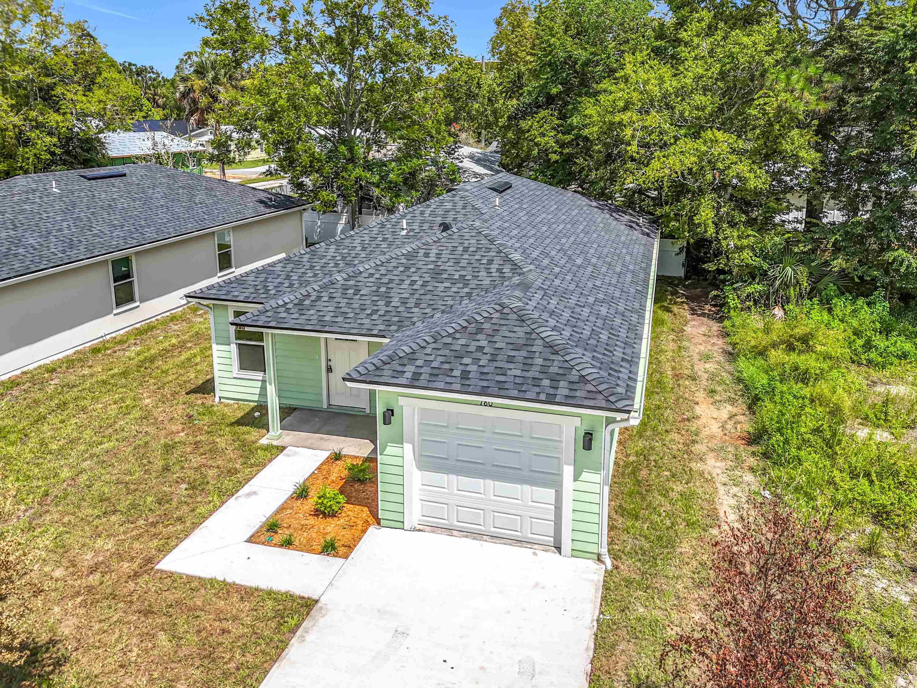 780 West 5th Street St. Augustine, FL 32084 - Photo 27 of 30 a view of a yard in front of house