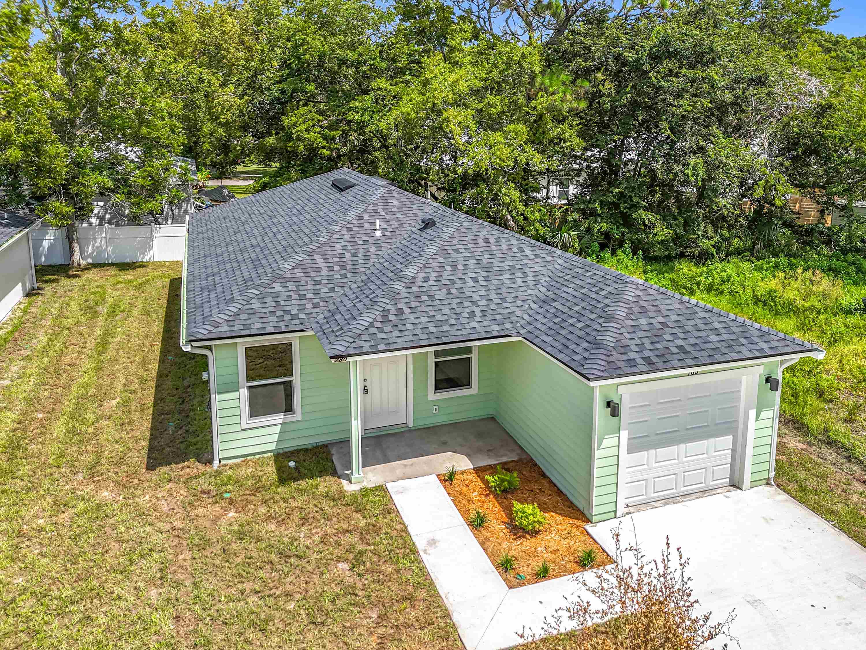 780 West 5th Street St. Augustine, FL 32084 - Photo 29 of 30 a aerial view of a house with a yard