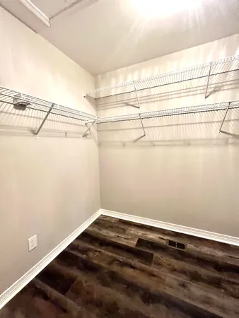 a view of a room with racks on the wall