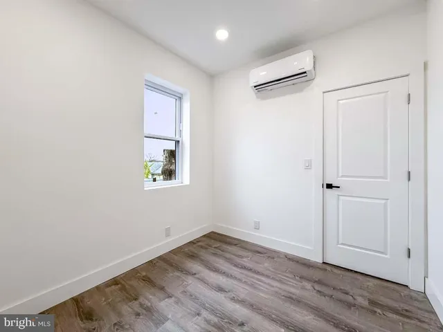 a kitchen with a stove and cabinets
