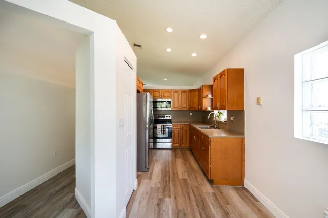 a large kitchen with cabinets