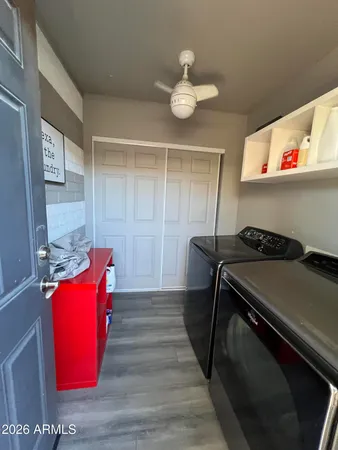 a view of hallway with washer and dryer