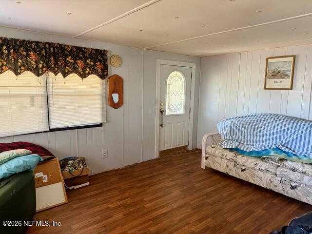 126 Golf Course Lane Crescent City, FL 32112 - Photo 11 of 23 a bedroom with a bed and window