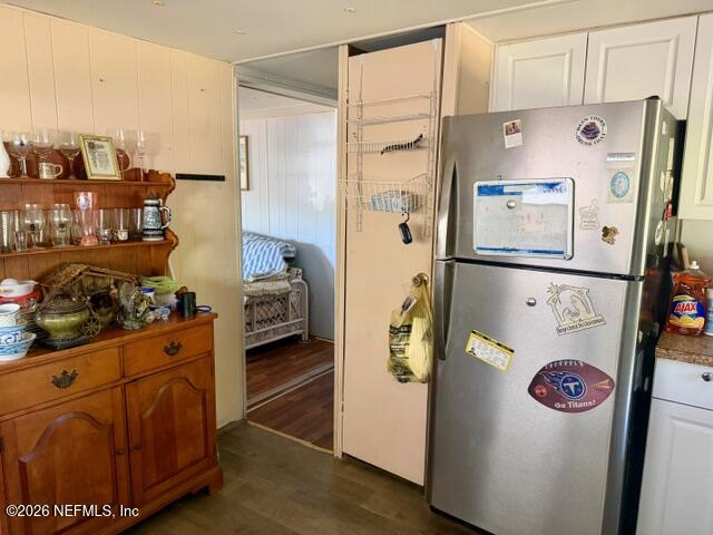 126 Golf Course Lane Crescent City, FL 32112 - Photo 13 of 23 a kitchen with refrigerator and white stove