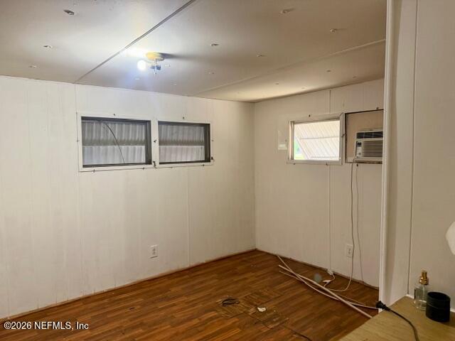 126 Golf Course Lane Crescent City, FL 32112 - Photo 19 of 23 a view of a room with wooden floor and window