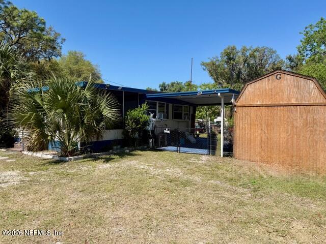 126 Golf Course Lane Crescent City, FL 32112 - Photo 2 of 23 a view of a house with backyard and sitting area