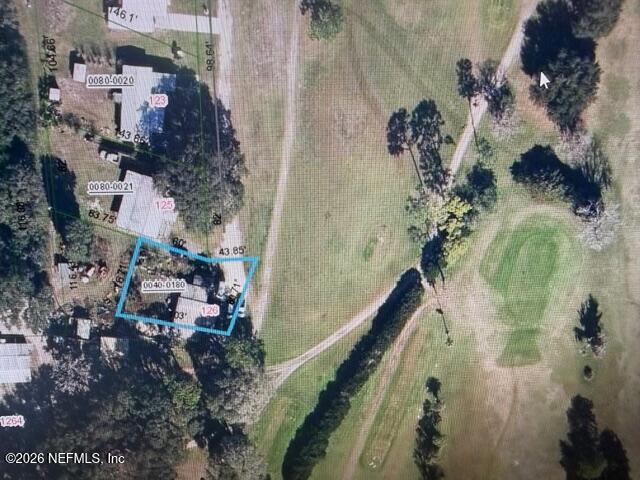 126 Golf Course Lane Crescent City, FL 32112 - Photo 23 of 23 an aerial view of residential house with outdoor space