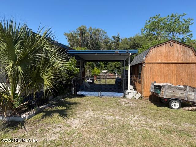 126 Golf Course Lane Crescent City, FL 32112 - Photo 3 of 23 a view of a car park in front of house
